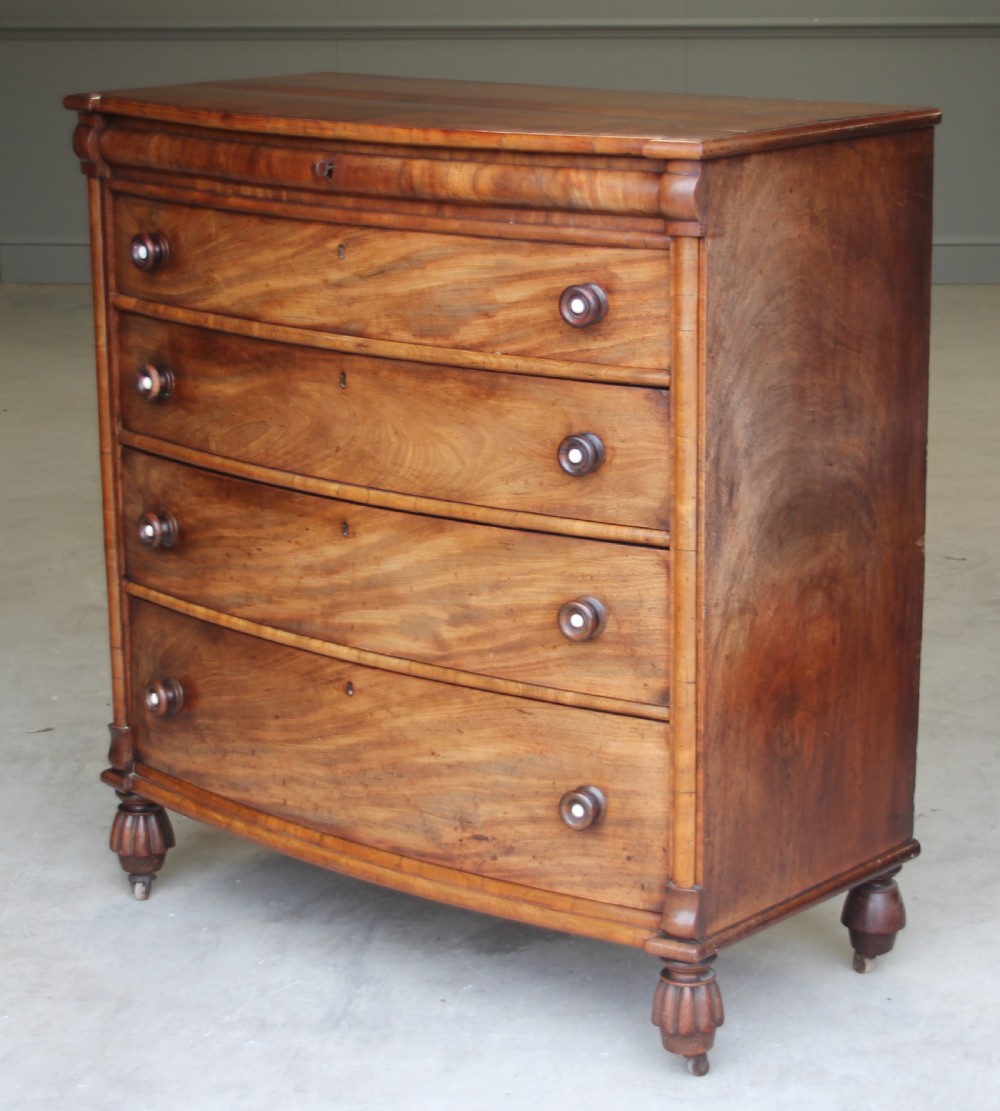 A William IV Mahogany Bow Breakfront chest of drawers View VII