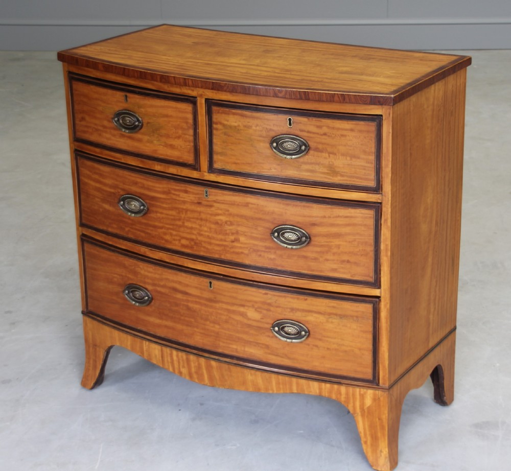An 18th century satinwood chest of drawers. 
