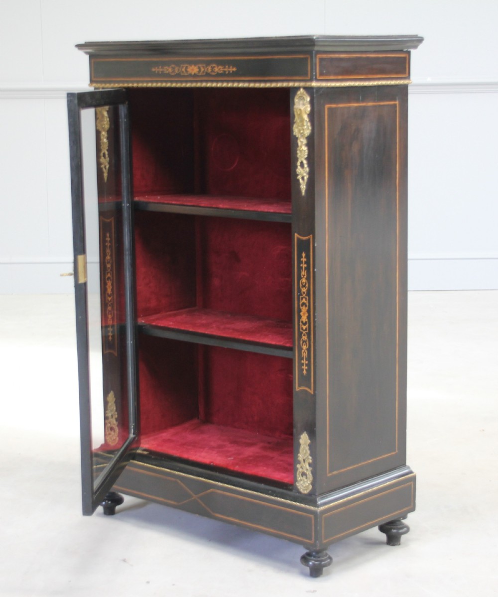 A Victorian ebonized display cabinet. View VII