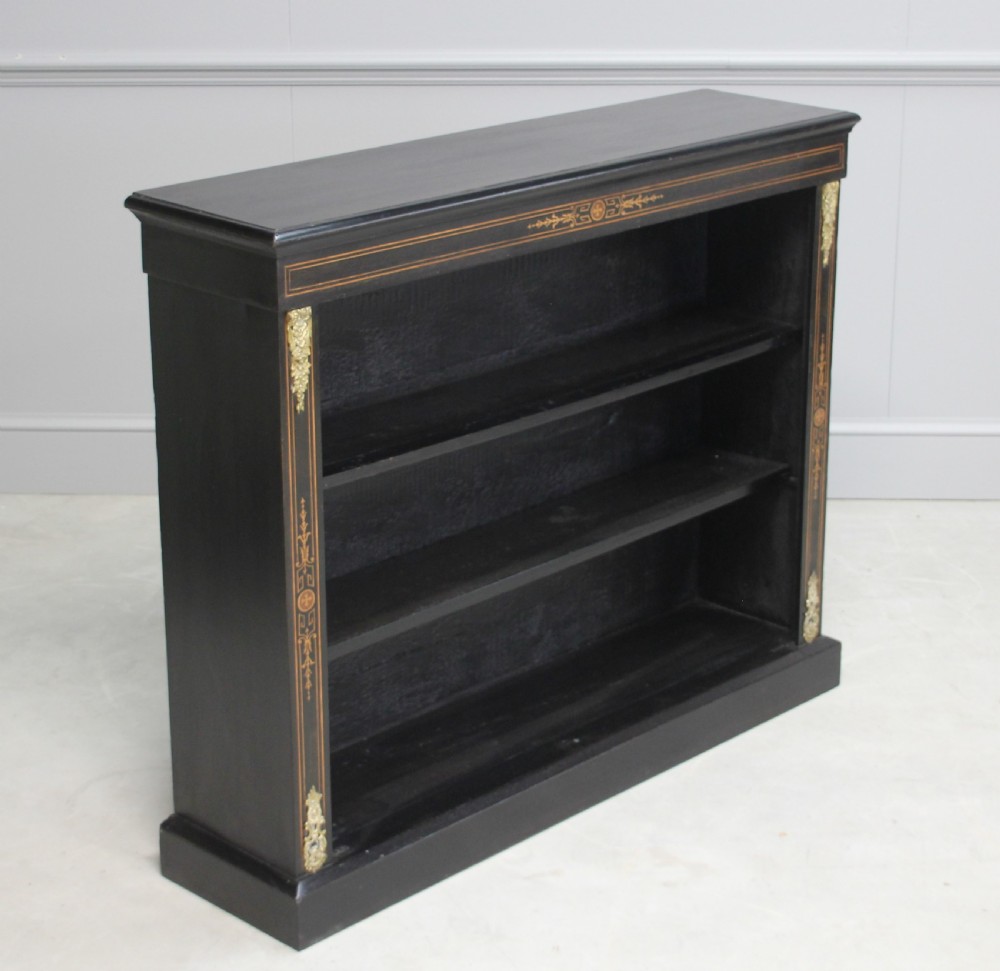 A Victorian ebonized open bookcase View IV