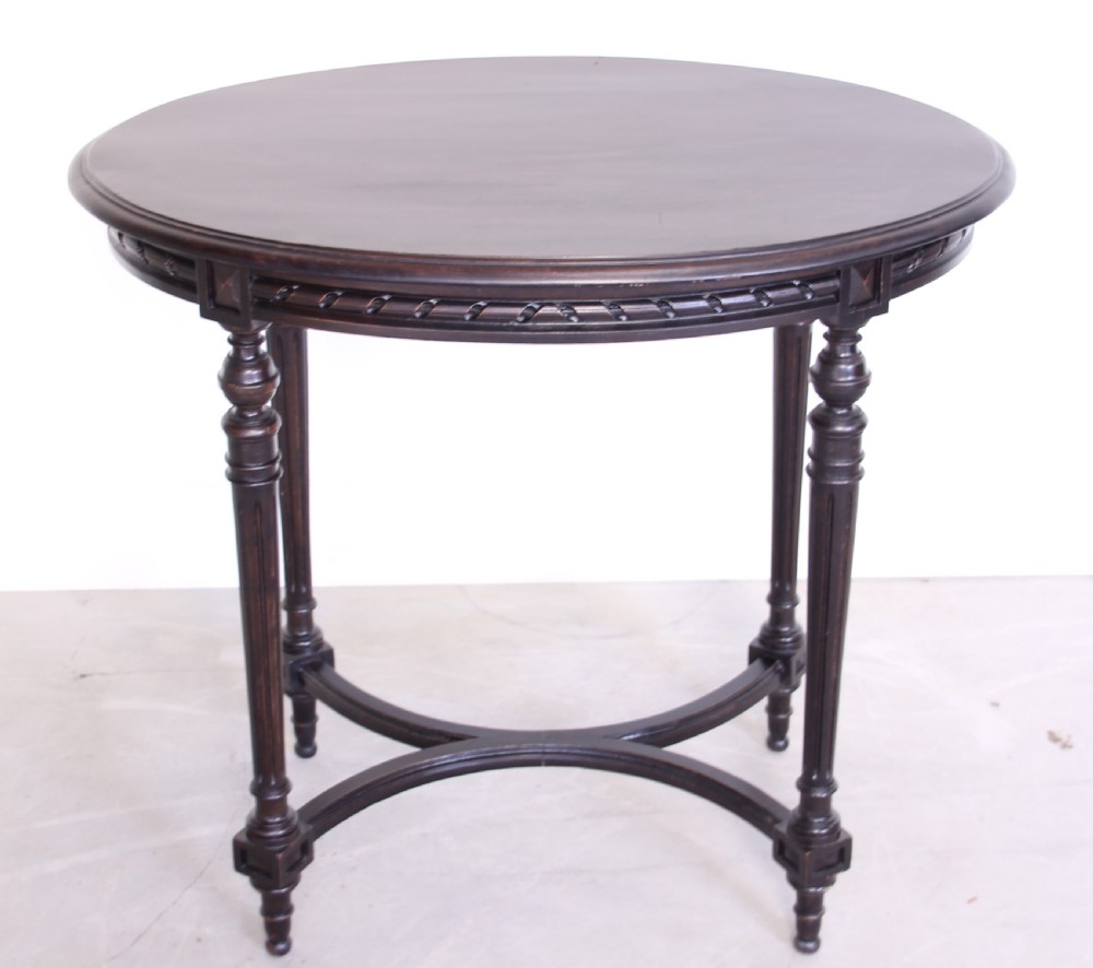 A 19th century ebonized table View II