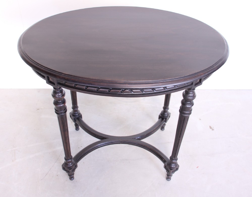A 19th century ebonized table View IV