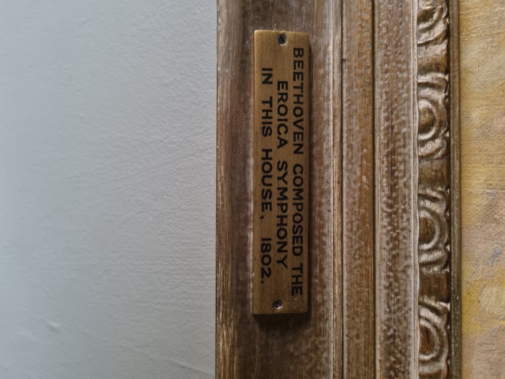 A carved framed oil on canvas. View VIII