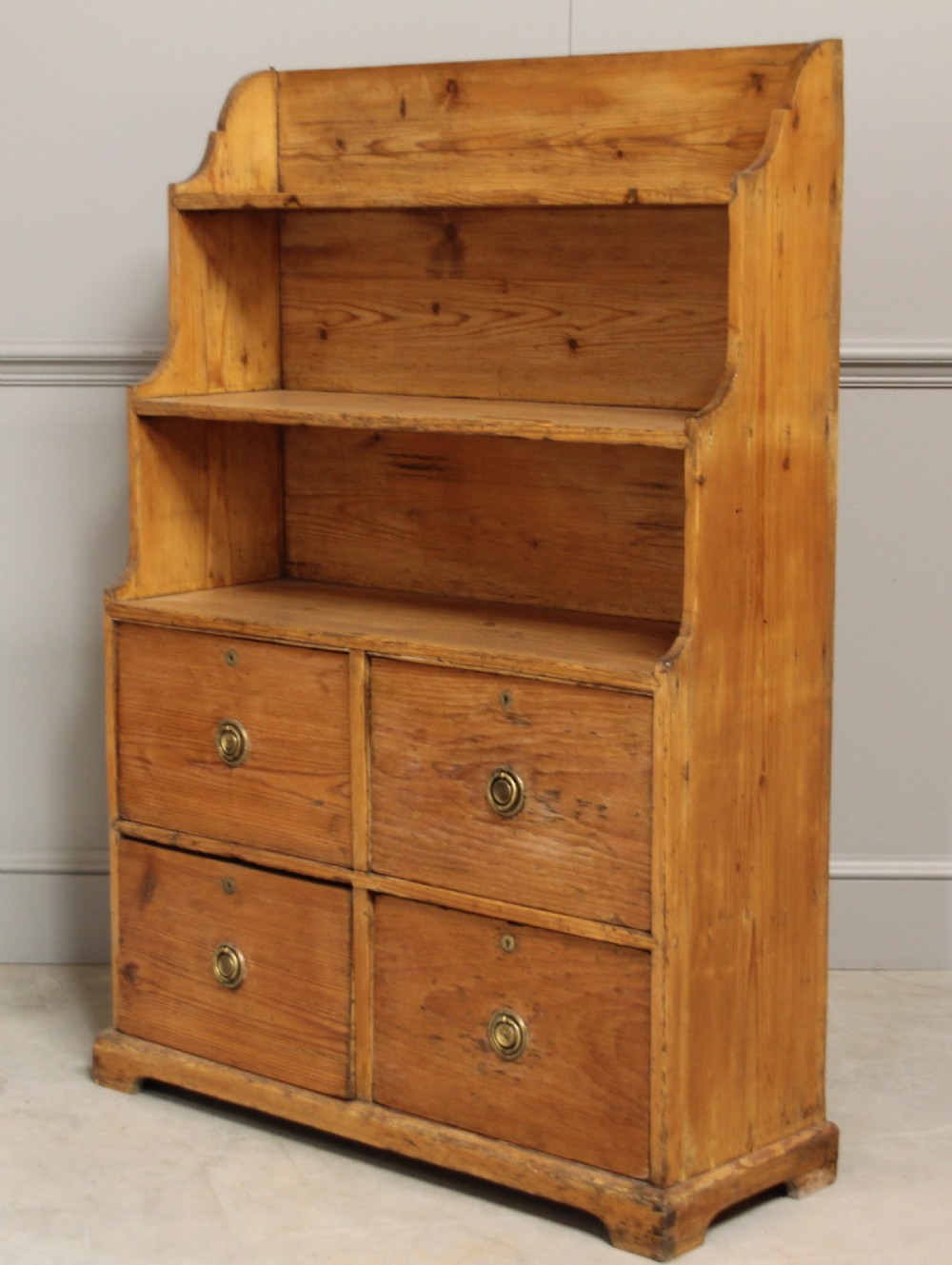 AN EARLY 19TH CENTURY PINE CHIFFONIER View III