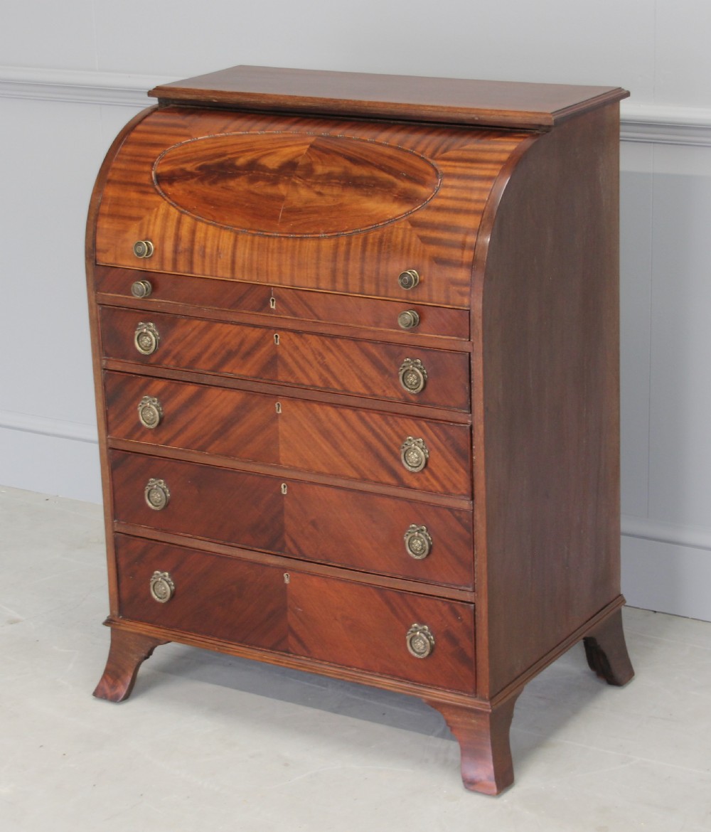 AN EDWARDIAN MAHOGANY CYLINDER BUREAU View II