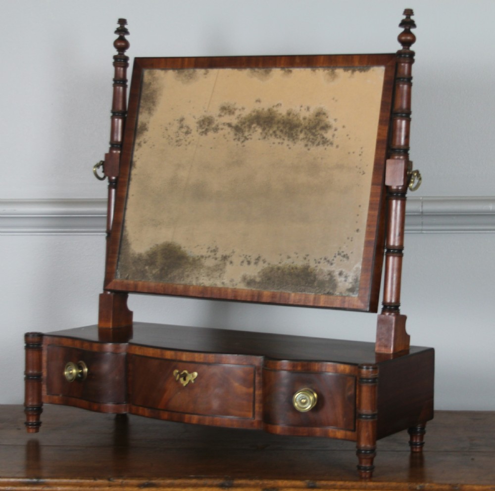 A REGENCY MAHOGANY SWING MIRROR View II