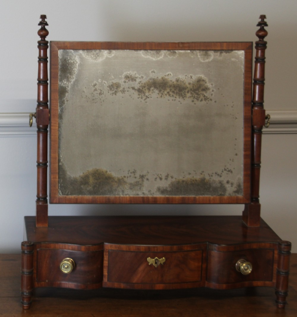 A REGENCY MAHOGANY SWING MIRROR View V