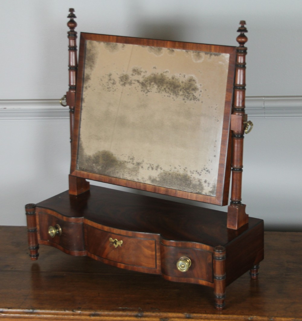 A REGENCY MAHOGANY SWING MIRROR View VI