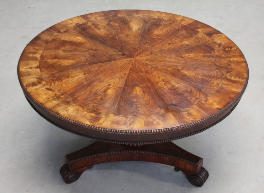 A 19TH CENTURY TILT-TOP ROSEWOOD COFFEE TABLE View II