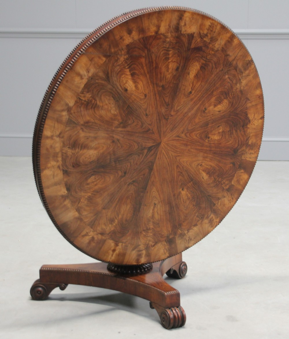 A 19TH CENTURY TILT-TOP ROSEWOOD COFFEE TABLE View III