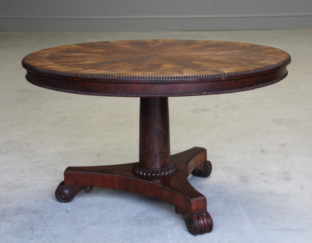A 19TH CENTURY TILT-TOP ROSEWOOD COFFEE TABLE View IV