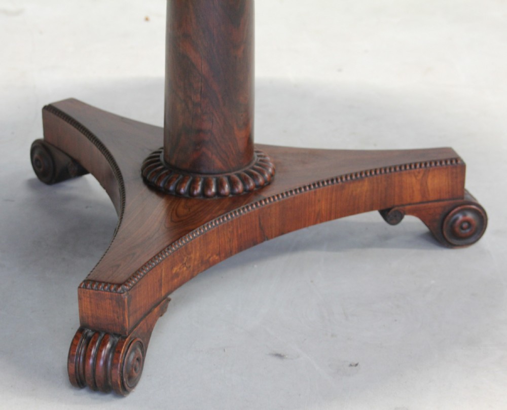 A 19TH CENTURY TILT-TOP ROSEWOOD COFFEE TABLE View V