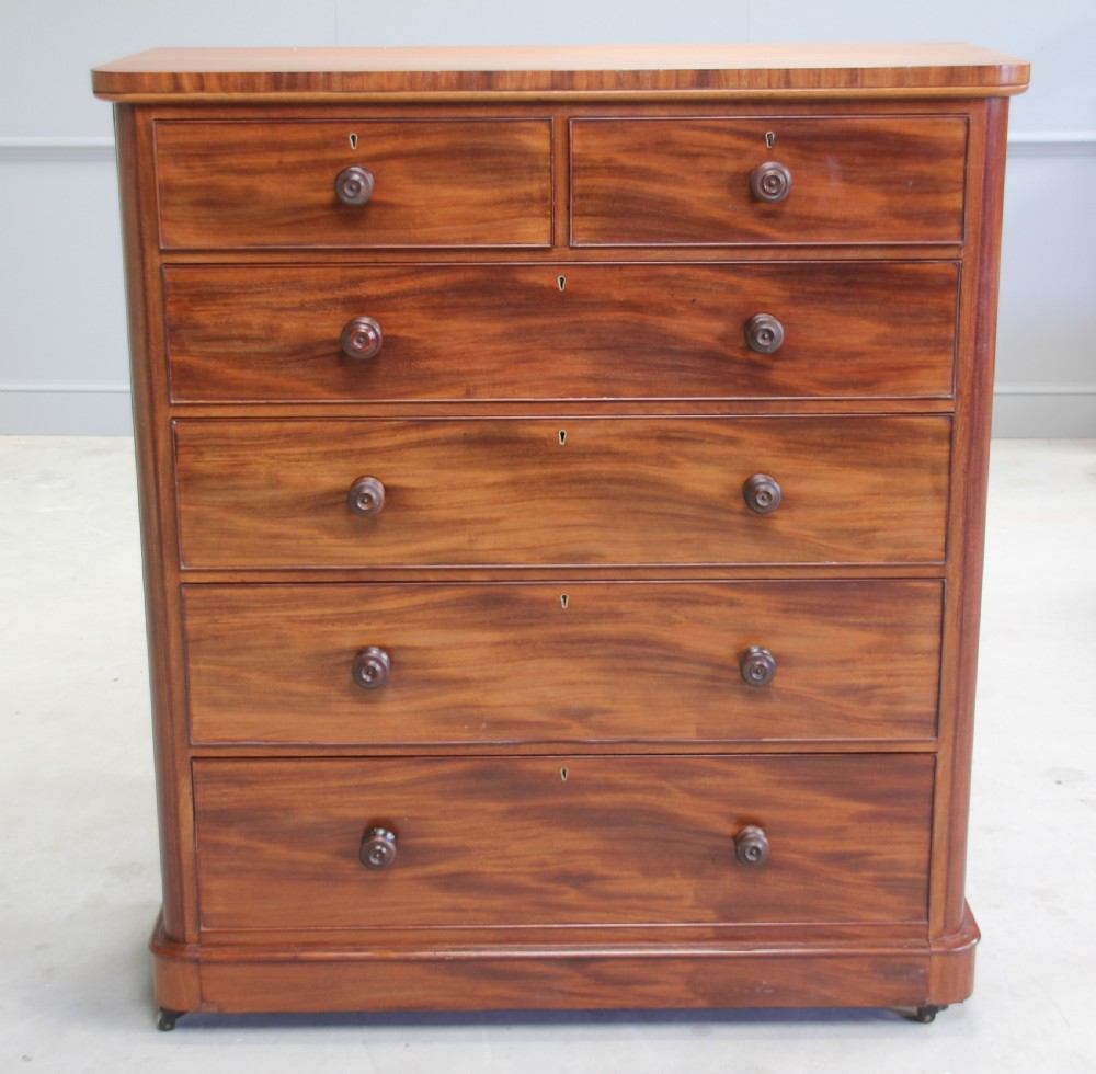 A LARGE VICTORIAN MAHOGANY CHEST OF DRAWERS View II