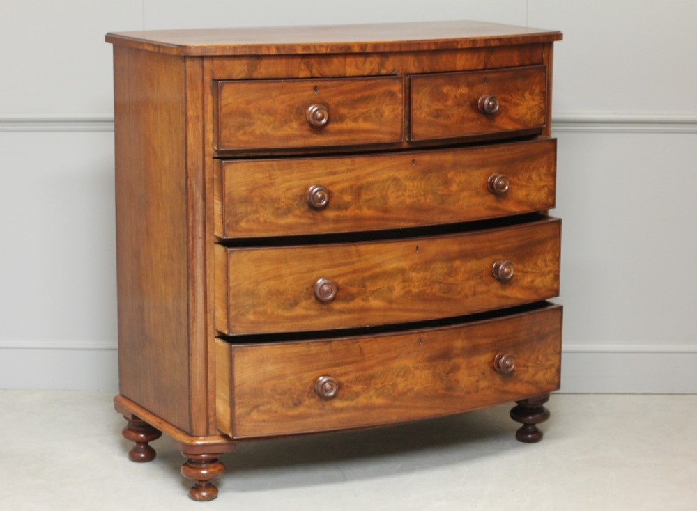 A Victorian Curl Mahogany bow fronted chest of drawers View IV
