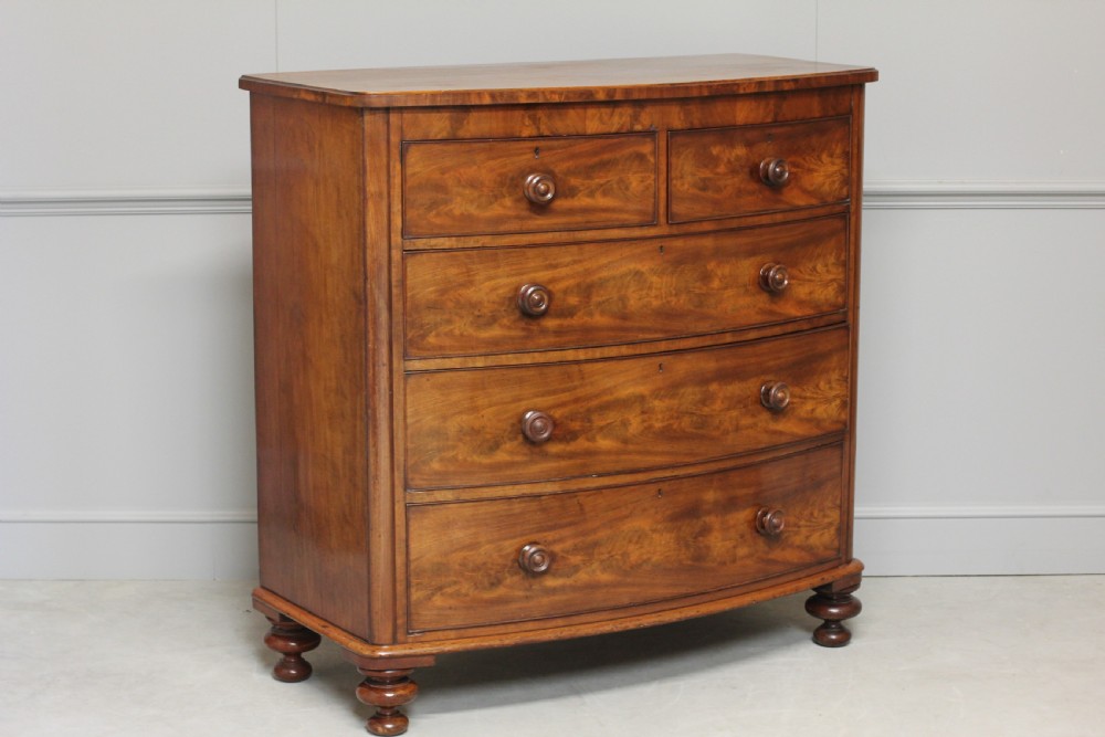 A Victorian Curl Mahogany bow fronted chest of drawers View V