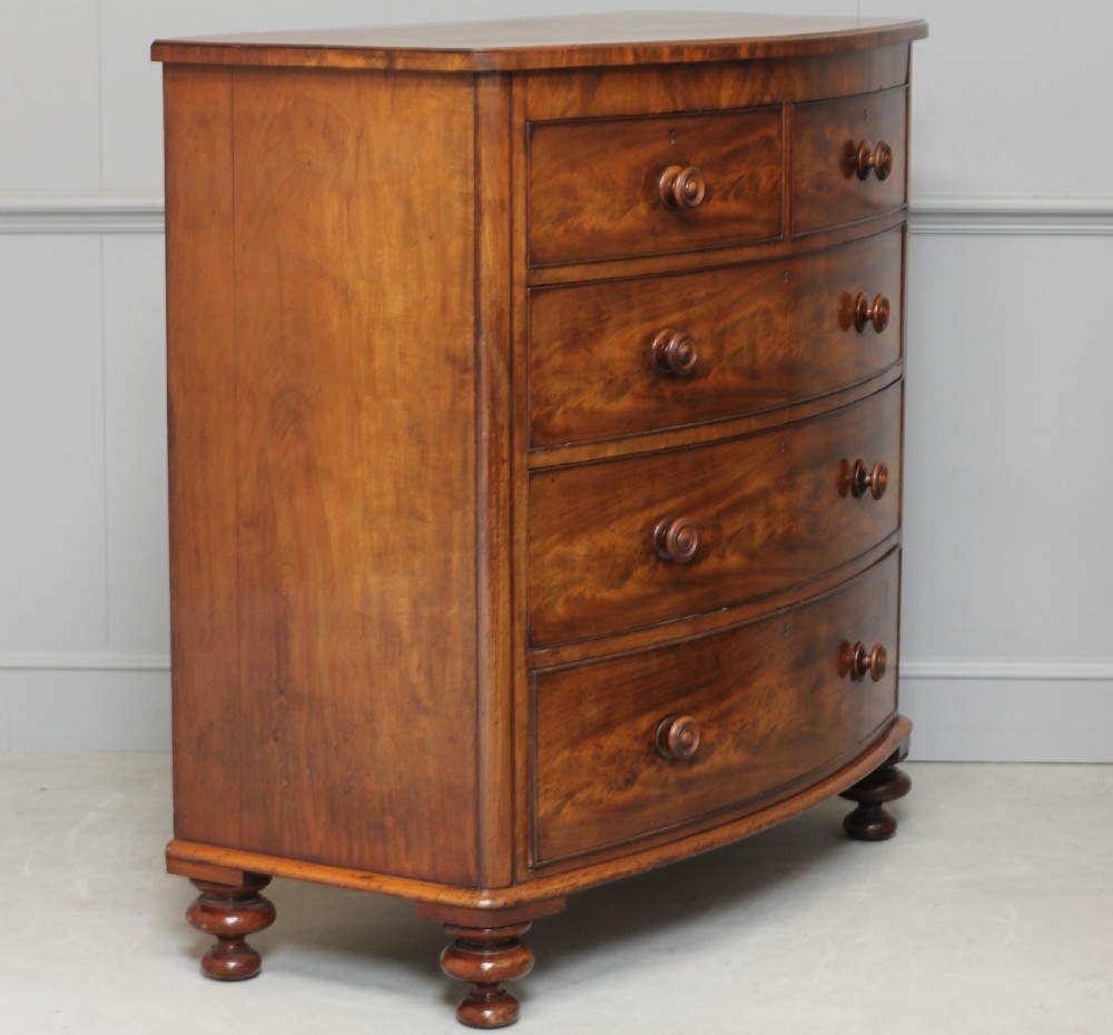 A Victorian Curl Mahogany bow fronted chest of drawers View VII