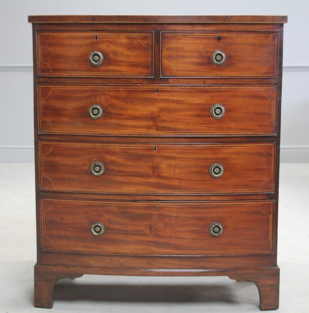 A GEORGAIN MAHOGANY CHEST OF DRAWEWRS