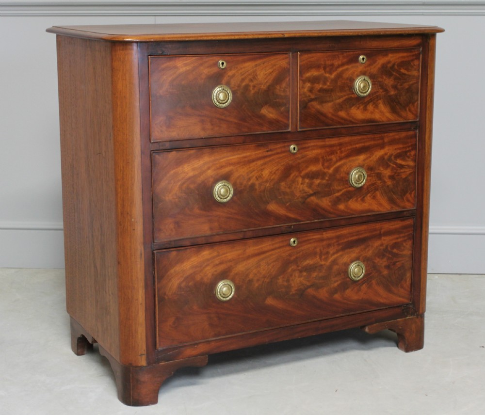A VICTORIAN MAHOGANY CHEST OF DRAWERS View III