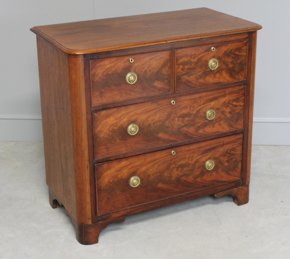 A VICTORIAN MAHOGANY CHEST OF DRAWERS View V