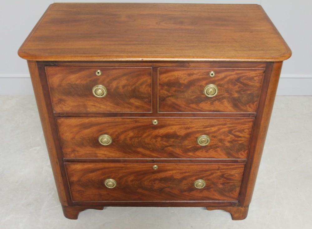 A VICTORIAN MAHOGANY CHEST OF DRAWERS View VI