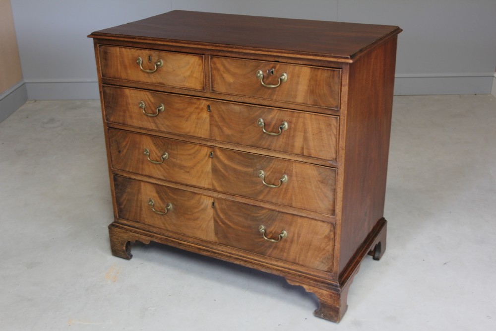 A GEORGE III MAHOGANY CHEST OF DRAWERS View V