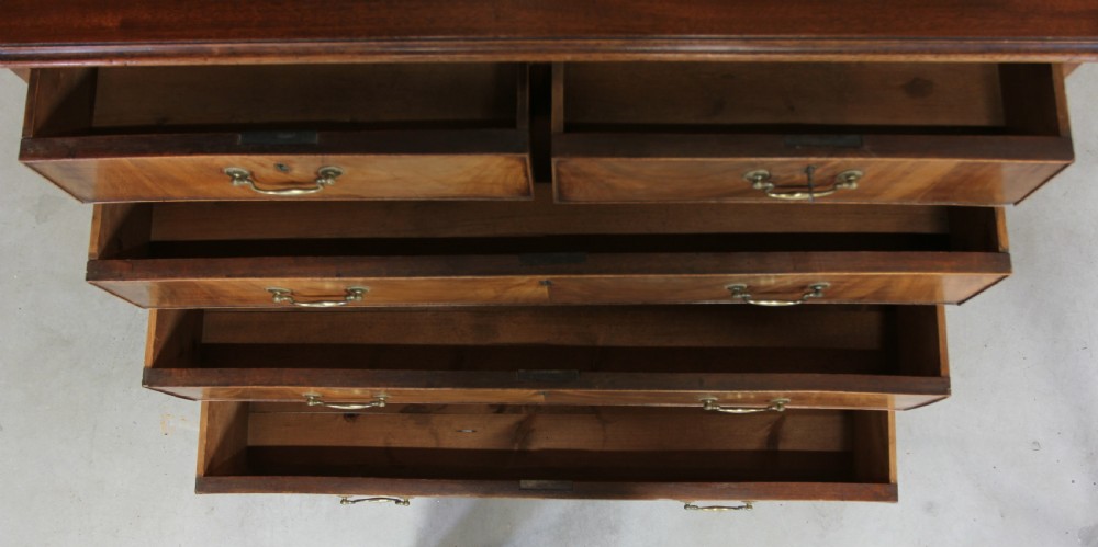 A GEORGE III MAHOGANY CHEST OF DRAWERS View VIII