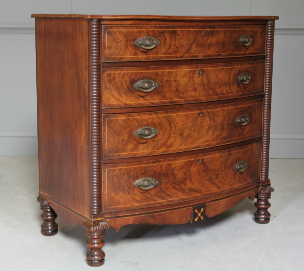 A WILLIAM IV MAHOGANY CHEST OF DRAWERS View II