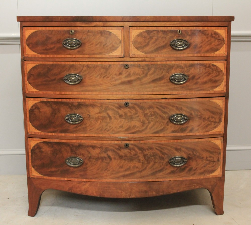 A REGENCY MAHOGANY CHEST OF DRAWERS