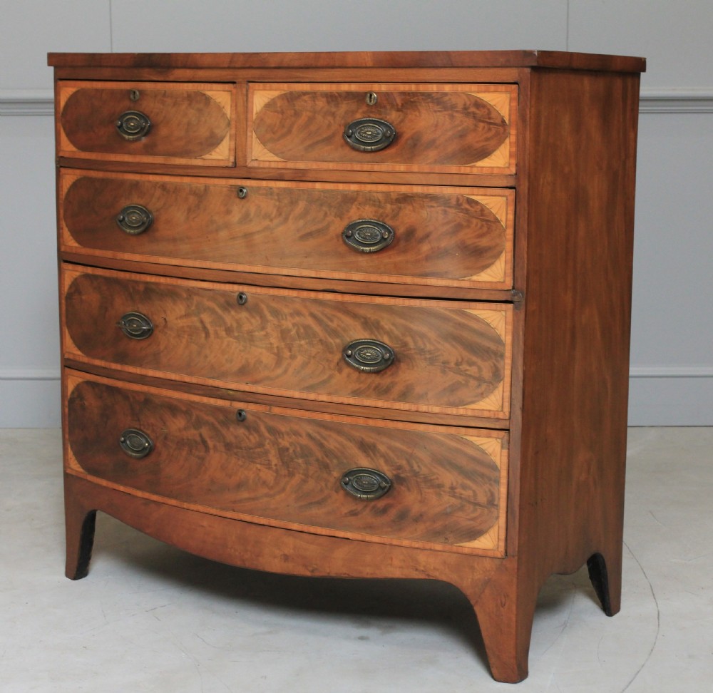 A REGENCY MAHOGANY CHEST OF DRAWERS View II