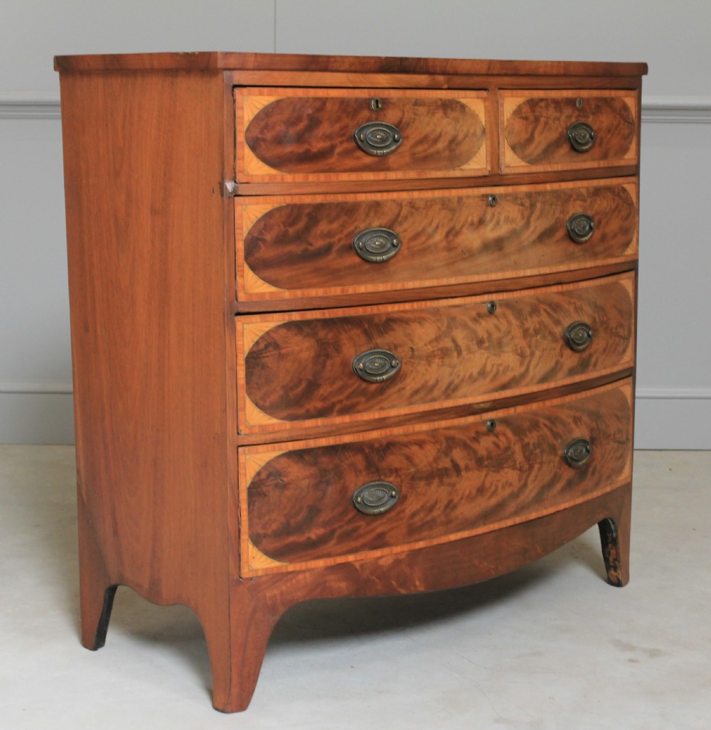 A REGENCY MAHOGANY CHEST OF DRAWERS View III