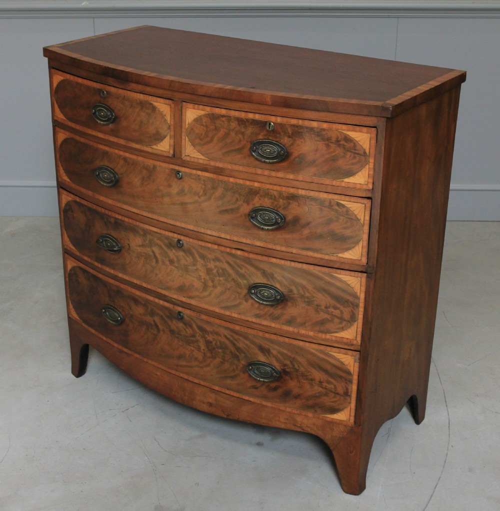 A REGENCY MAHOGANY CHEST OF DRAWERS View V