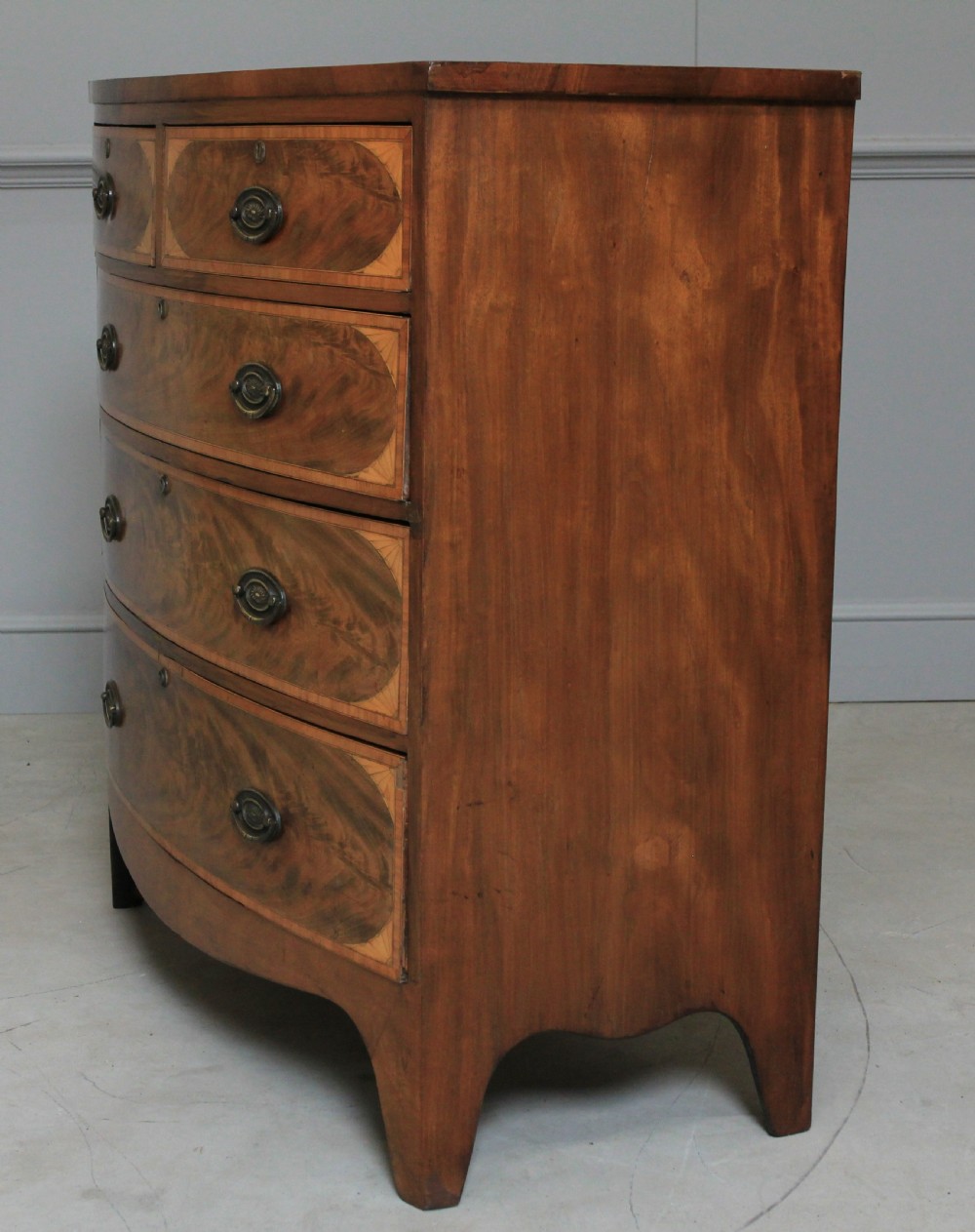 A REGENCY MAHOGANY CHEST OF DRAWERS View VII