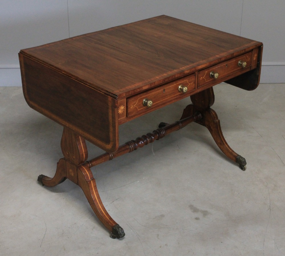A Regency inlaid rosewood sofa table View IV