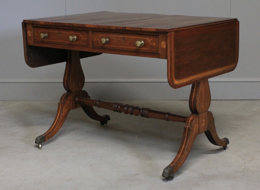 A Regency inlaid rosewood sofa table View V