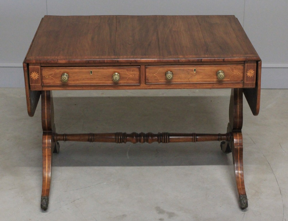 A Regency inlaid rosewood sofa table View VI