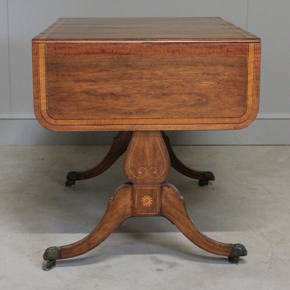 A Regency inlaid rosewood sofa table View VIII