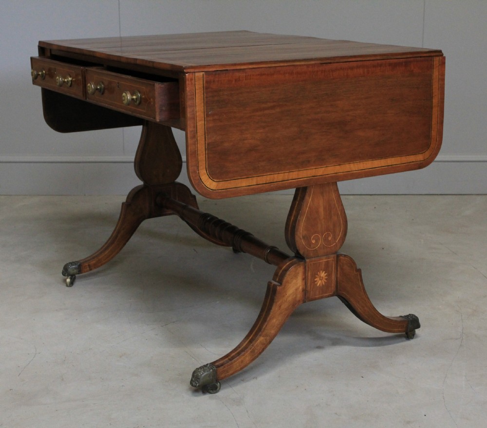 A Regency inlaid rosewood sofa table View IX