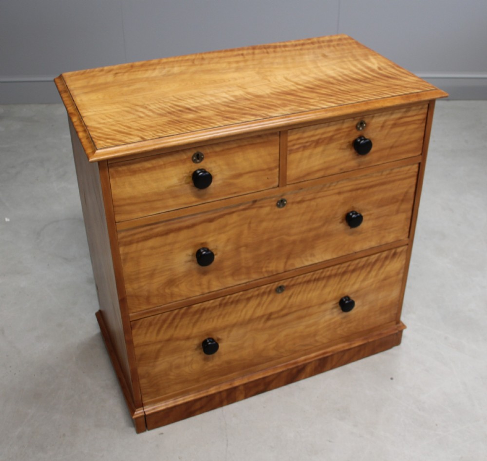 A VICTORIAN SATINBIRCH CHEST OF DRAWERS View IV