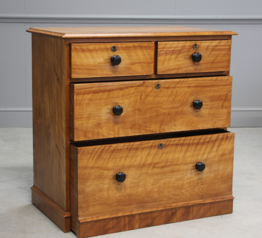 A VICTORIAN SATINBIRCH CHEST OF DRAWERS View V