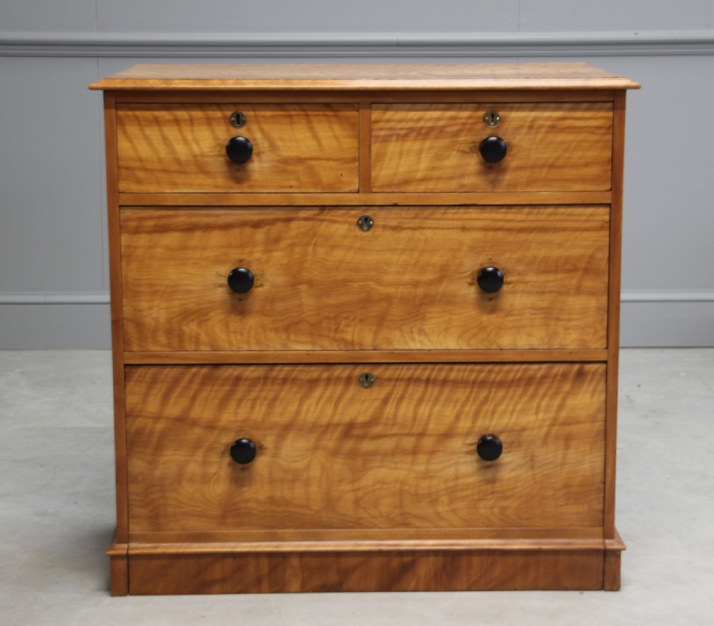A VICTORIAN SATINBIRCH CHEST OF DRAWERS View VI