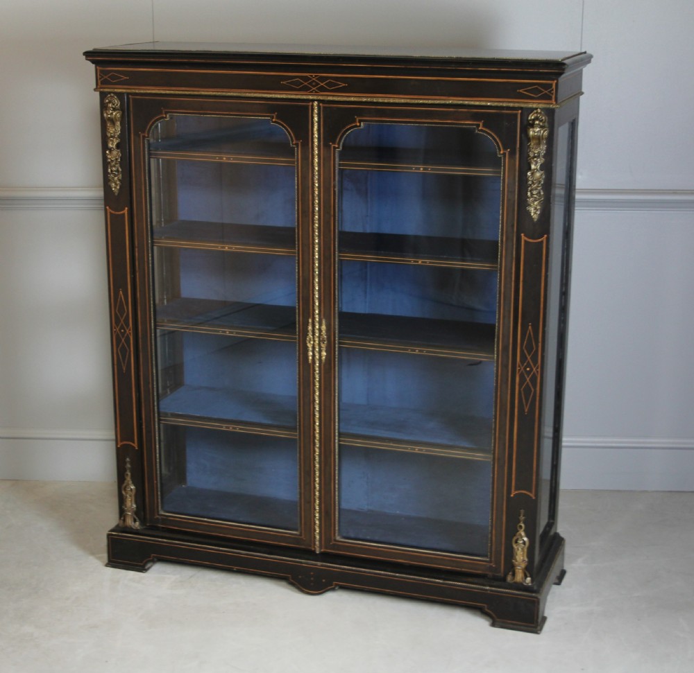 A VICTORIAN EBONIZED DISPLAY CABINET  View III