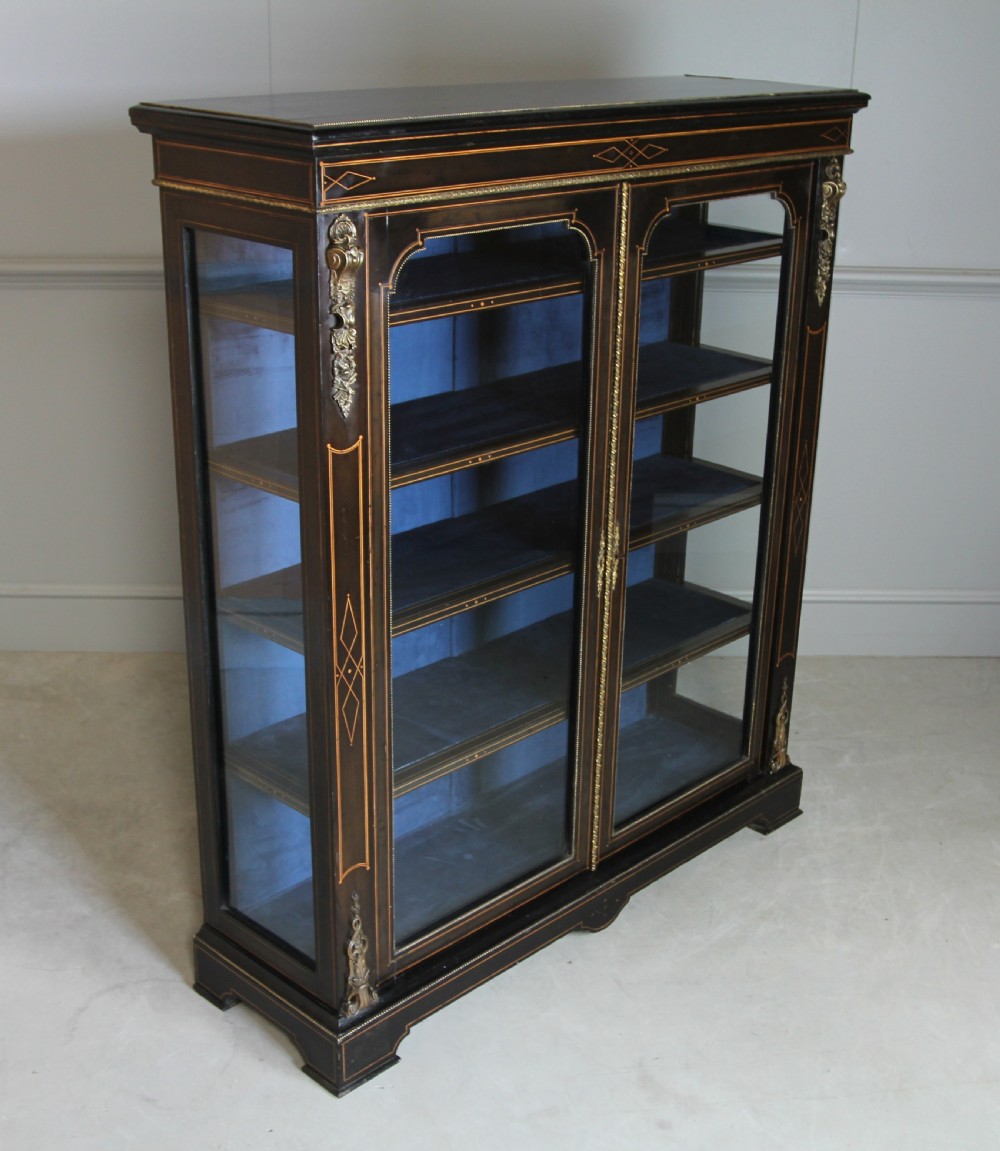 A VICTORIAN EBONIZED DISPLAY CABINET  View IV