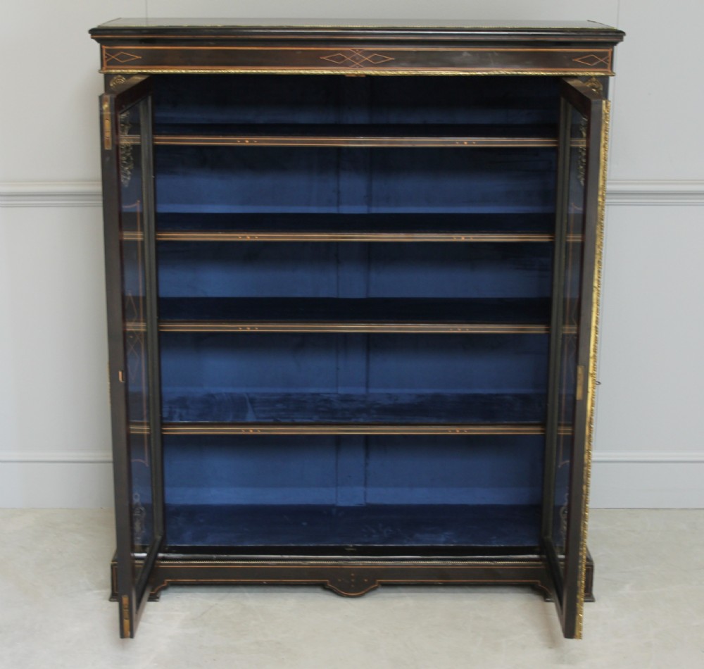 A VICTORIAN EBONIZED DISPLAY CABINET  View VI
