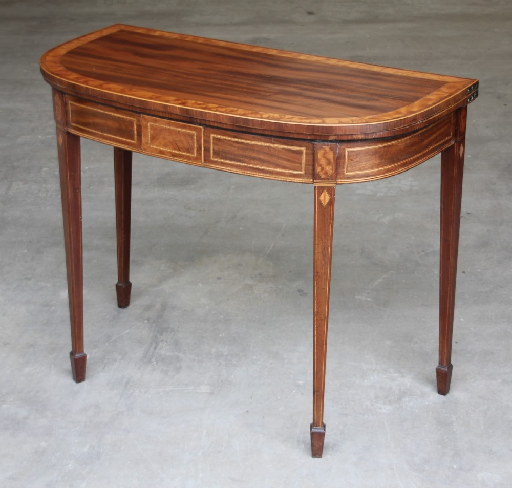 A REGENCY MAHOGANY CARD TABLE