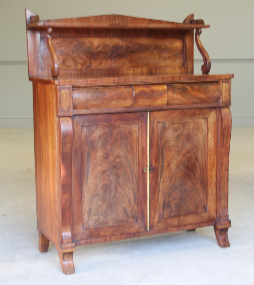 A WILLIAM IV FLAME MAHOGANY CHIFFONIER View II