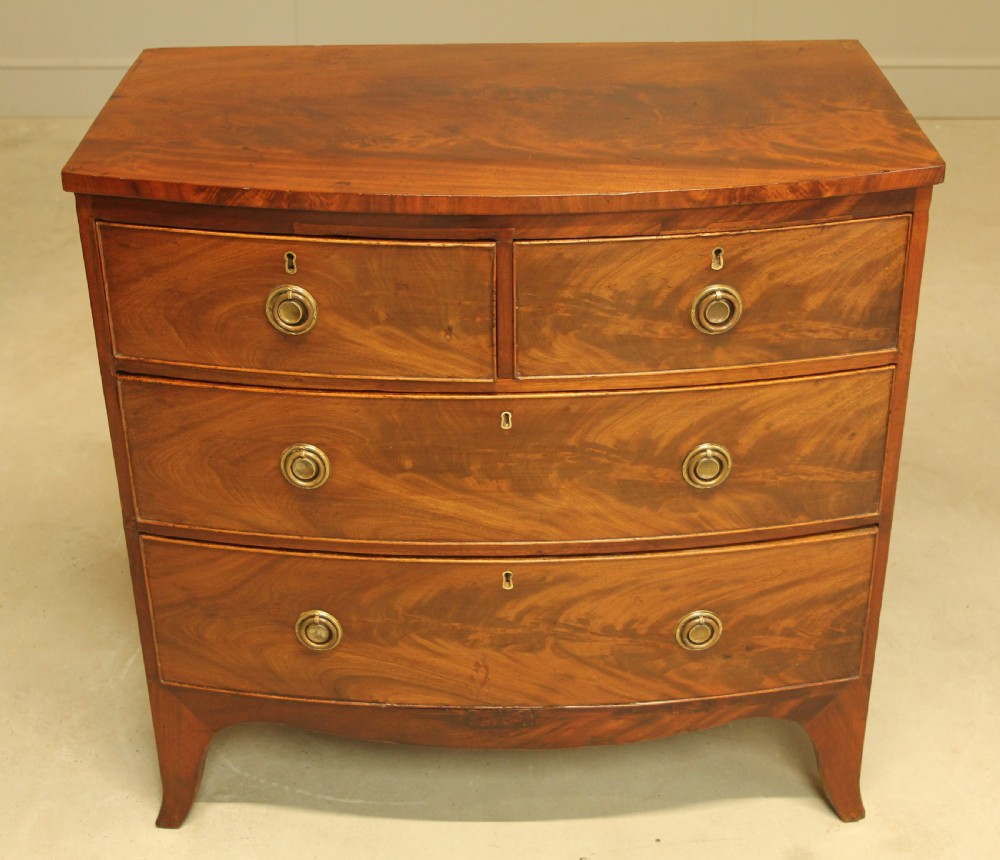 A Regency bow front chest of drawers. View III