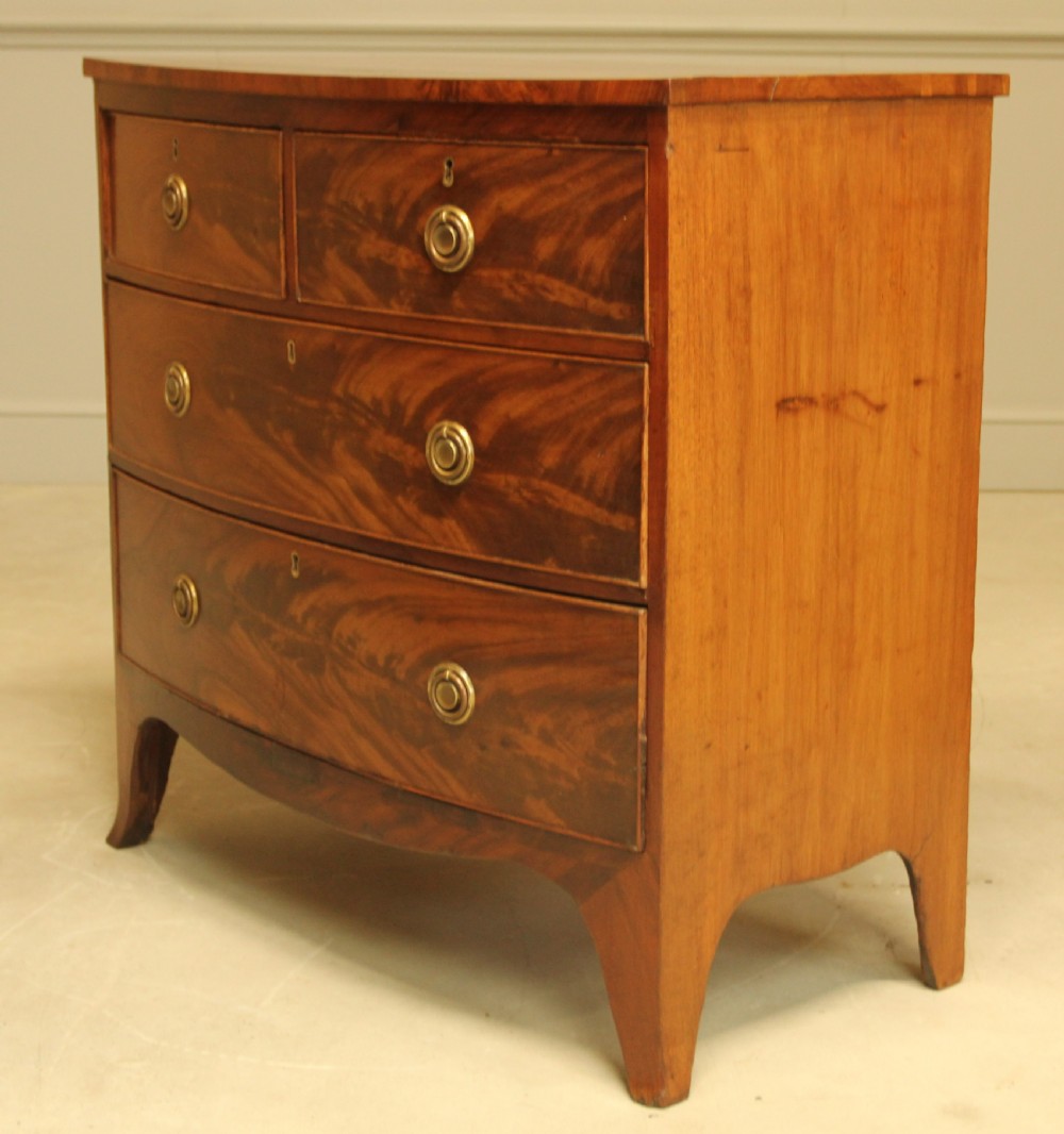 A Regency bow front chest of drawers. View VIII