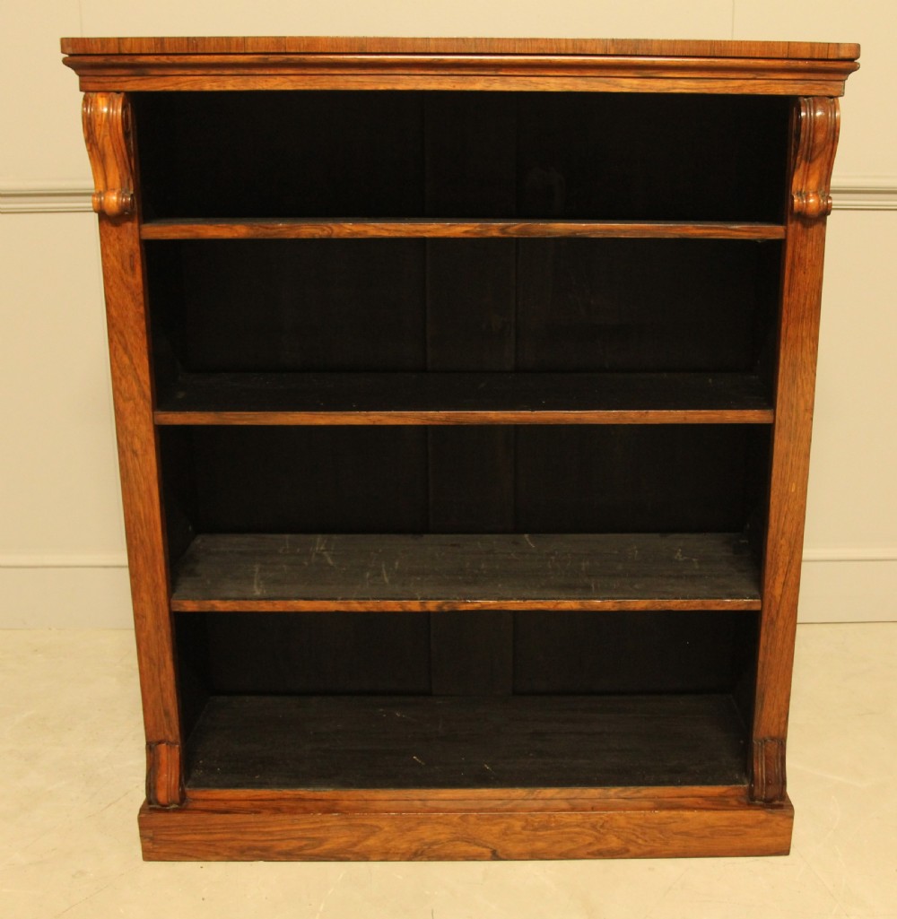 A VICTORIAN ROSEWOOD OPEN BOOKCASE