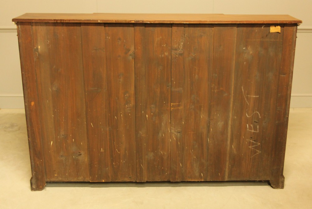 AN EARLY 19TH CENTURY MAHAGANY BREAKFRONT OPEN BOOKCASE View VIII