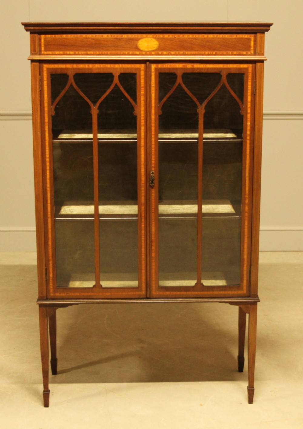 AN EDWARDIAN MAHOGANY DISPLAY CABINET